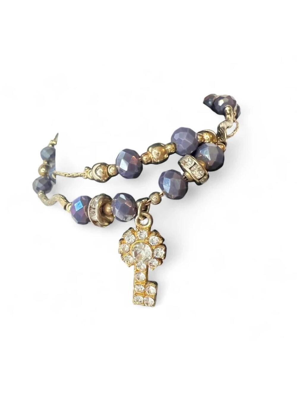 A Vintage 22kgp key charm bracelet